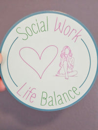 Circular sign with 'Social Work' and 'Life Balance' text and a heart symbol with a women drinking from a mug on a light blue background
